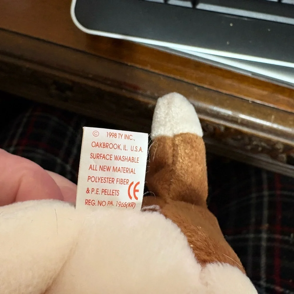 Collectors item: TAG ERRORD1997 Ty Tracker Beanie Baby, Rare, PE PELLETS. NWT.
